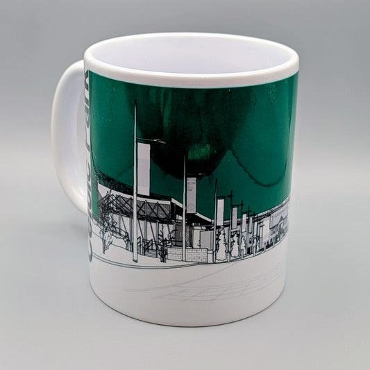 Mug with architectural design on a green background