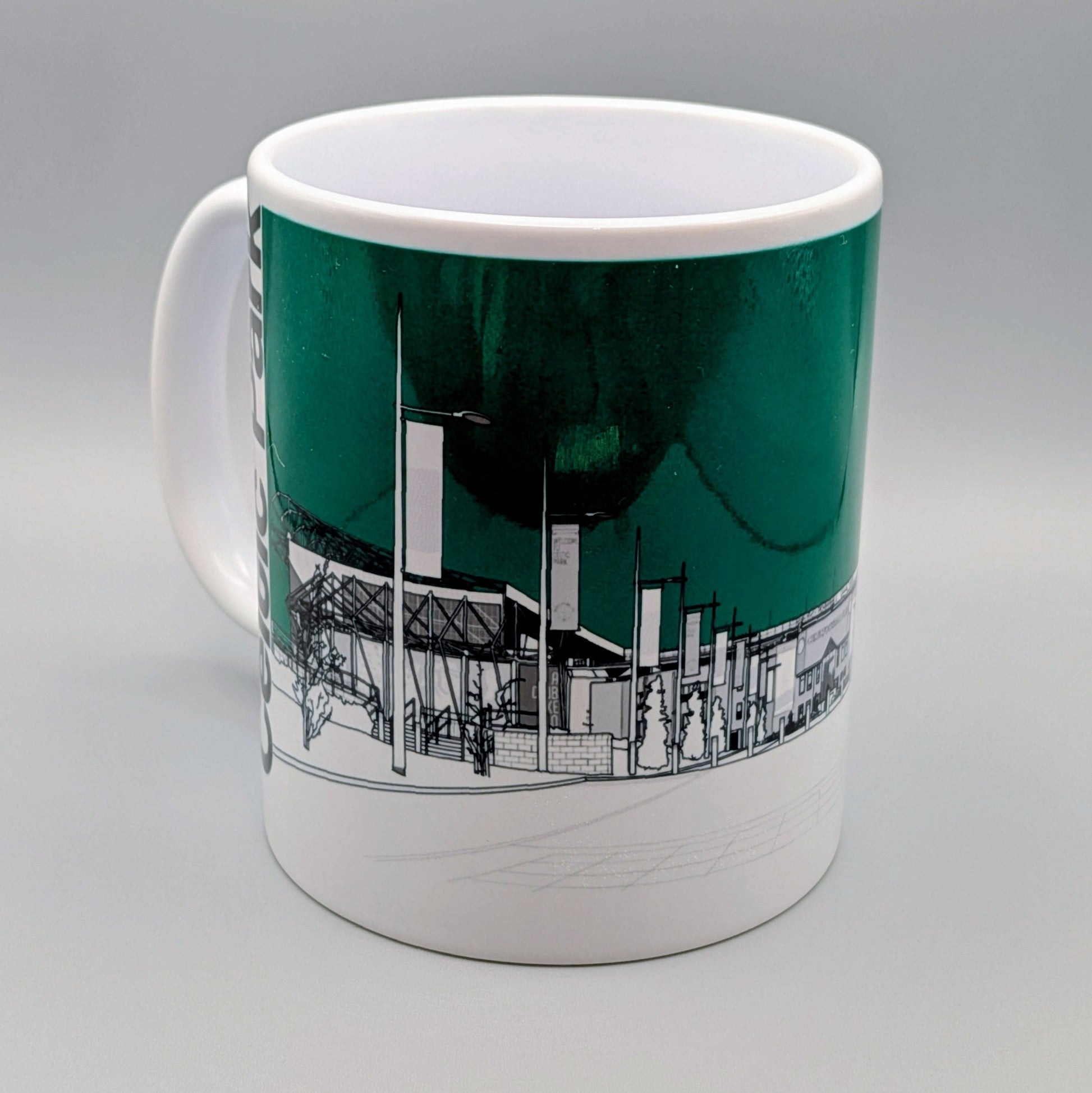 Mug with architectural design on a green background