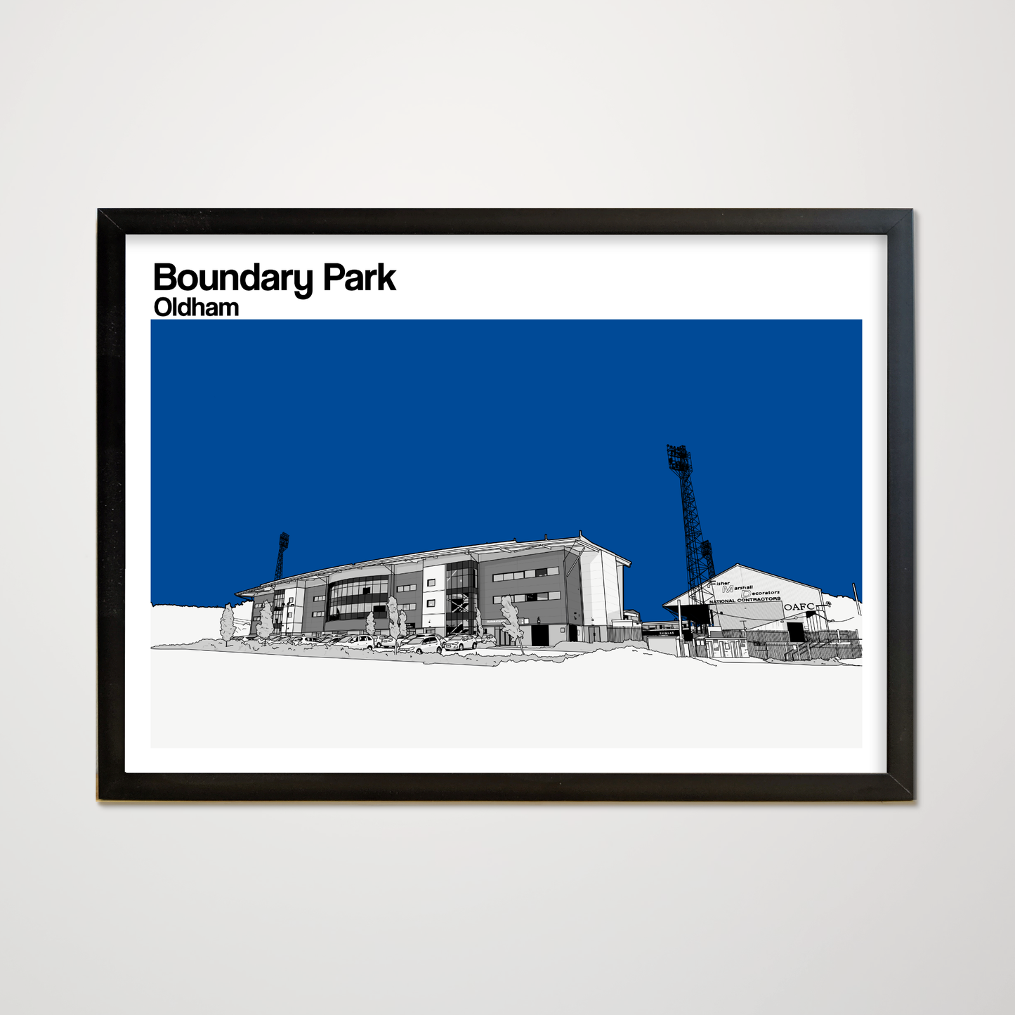 Framed artwork of Boundary Park stadium in Oldham with a blue sky background.